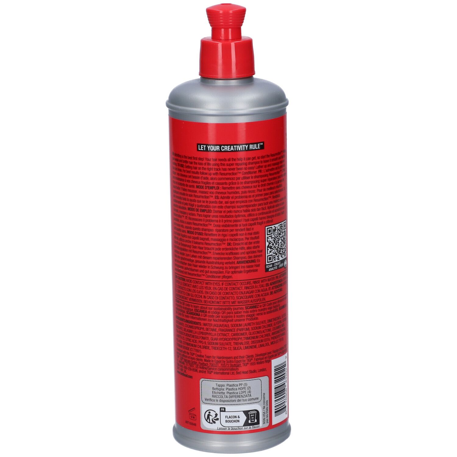 Bouteille rouge avec distributeur argenté et base argentée.