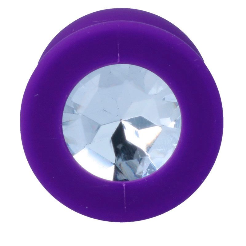 Close-up van de paarse anale plug met kristal in de flens.