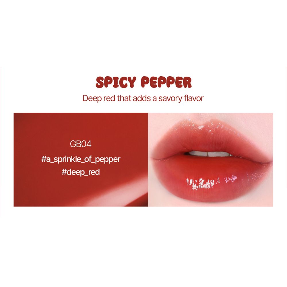Gros plan sur des lèvres avec un gloss rouge. Texte : Spicy Pepper, GB04, #a_sprinkle_of_pepper, #deep_red.