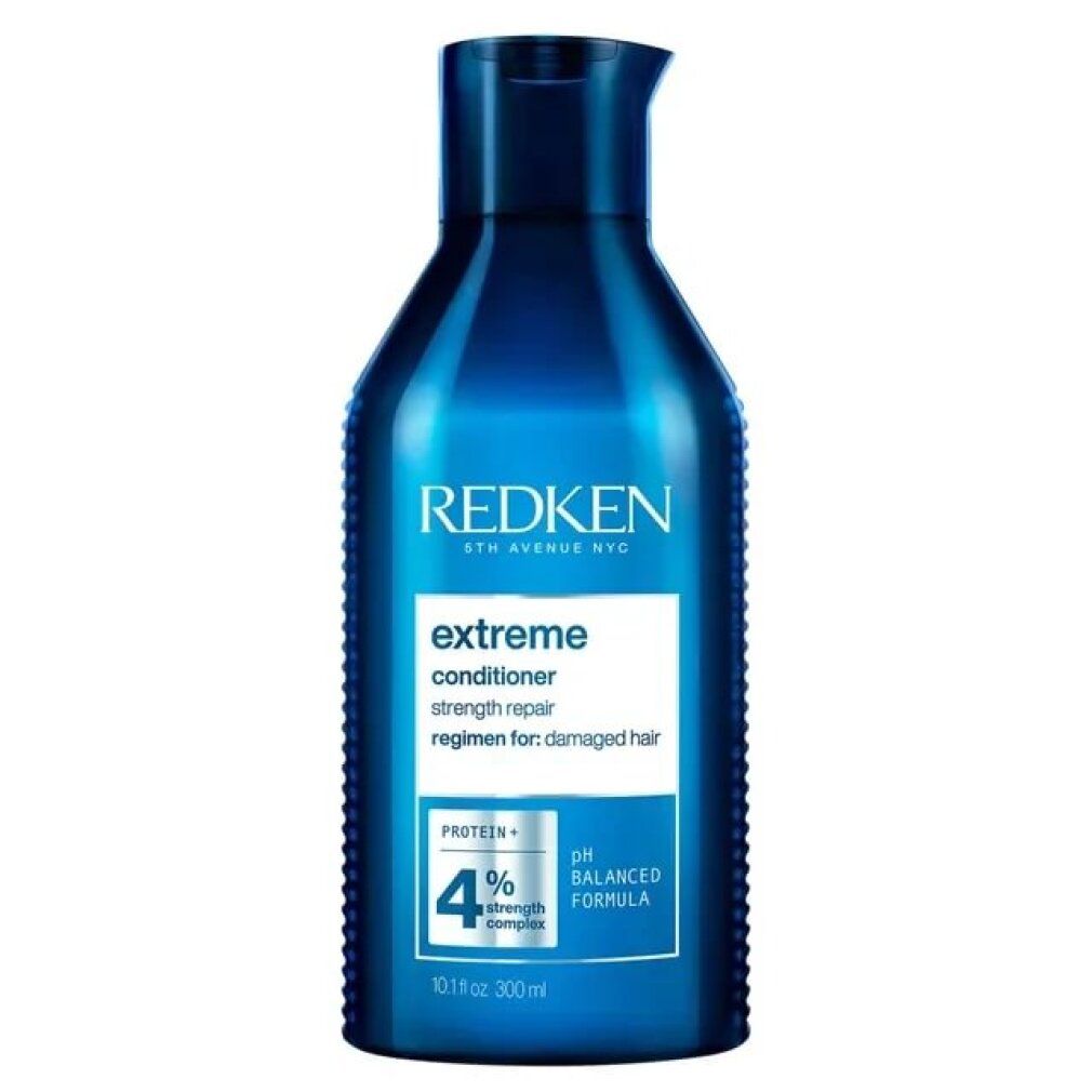 Donkerblauwe fles Redken Extreme Conditioner. Opschrift: Extreme, Conditioner, pH Balanced Formula. 300ml.