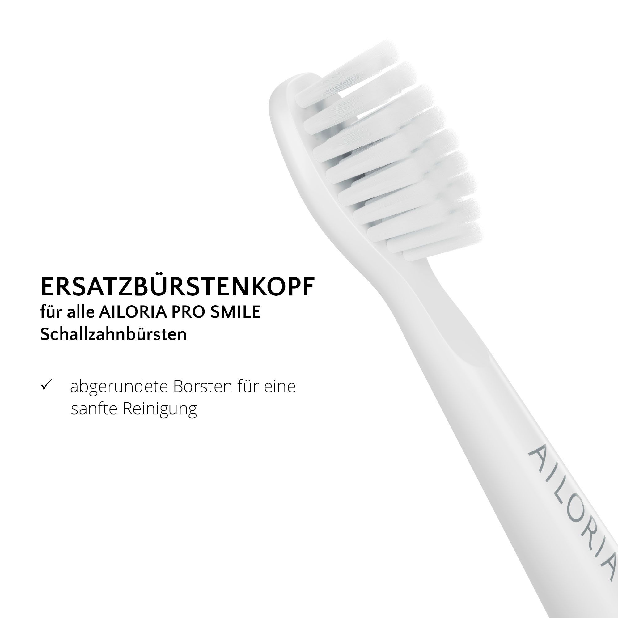 Gros plan d'une tête de brosse à dents blanche. Texte: Tête de remplacement pour AILORIA PRO SMILE. Soies arrondies.