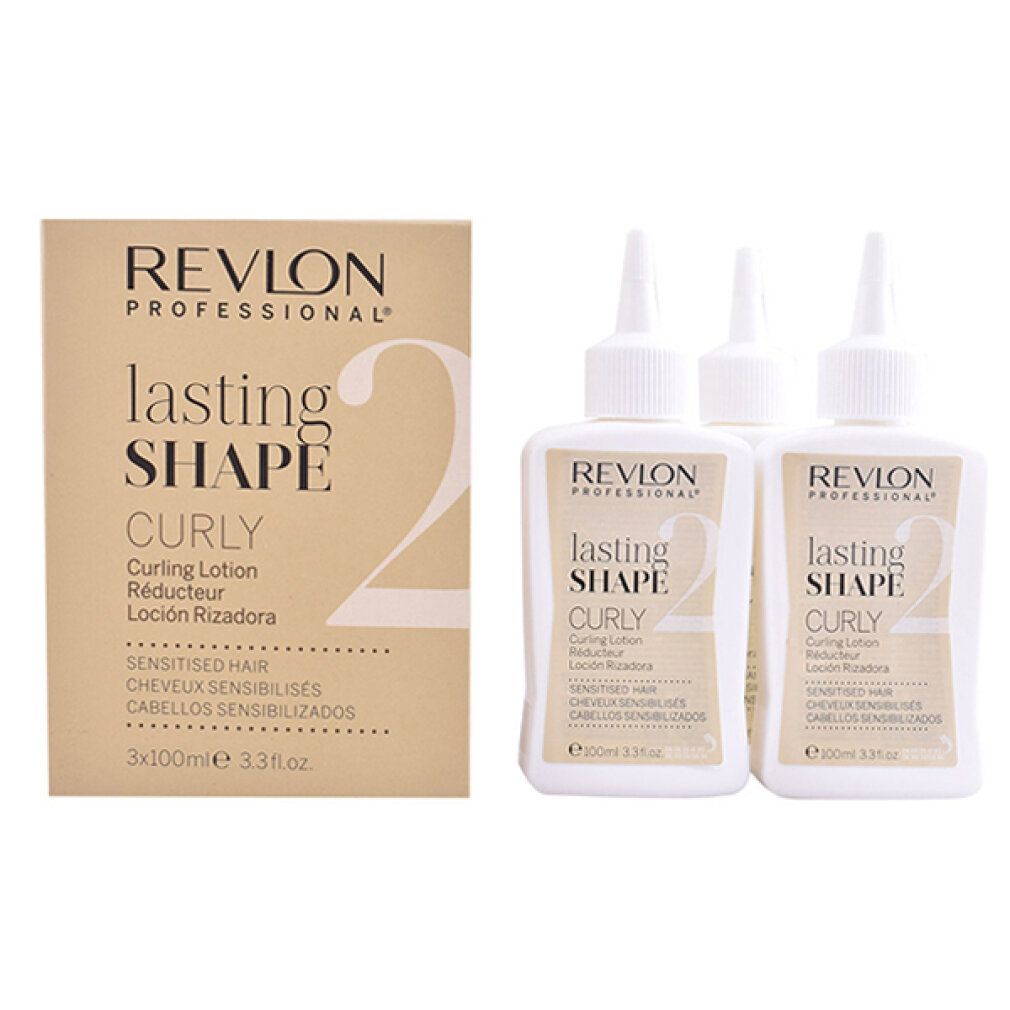 Drie flessen en een doos Revlon Lasting Shape 2 Curly Lotion. Opschrift: Curly, Gevoelig haar.