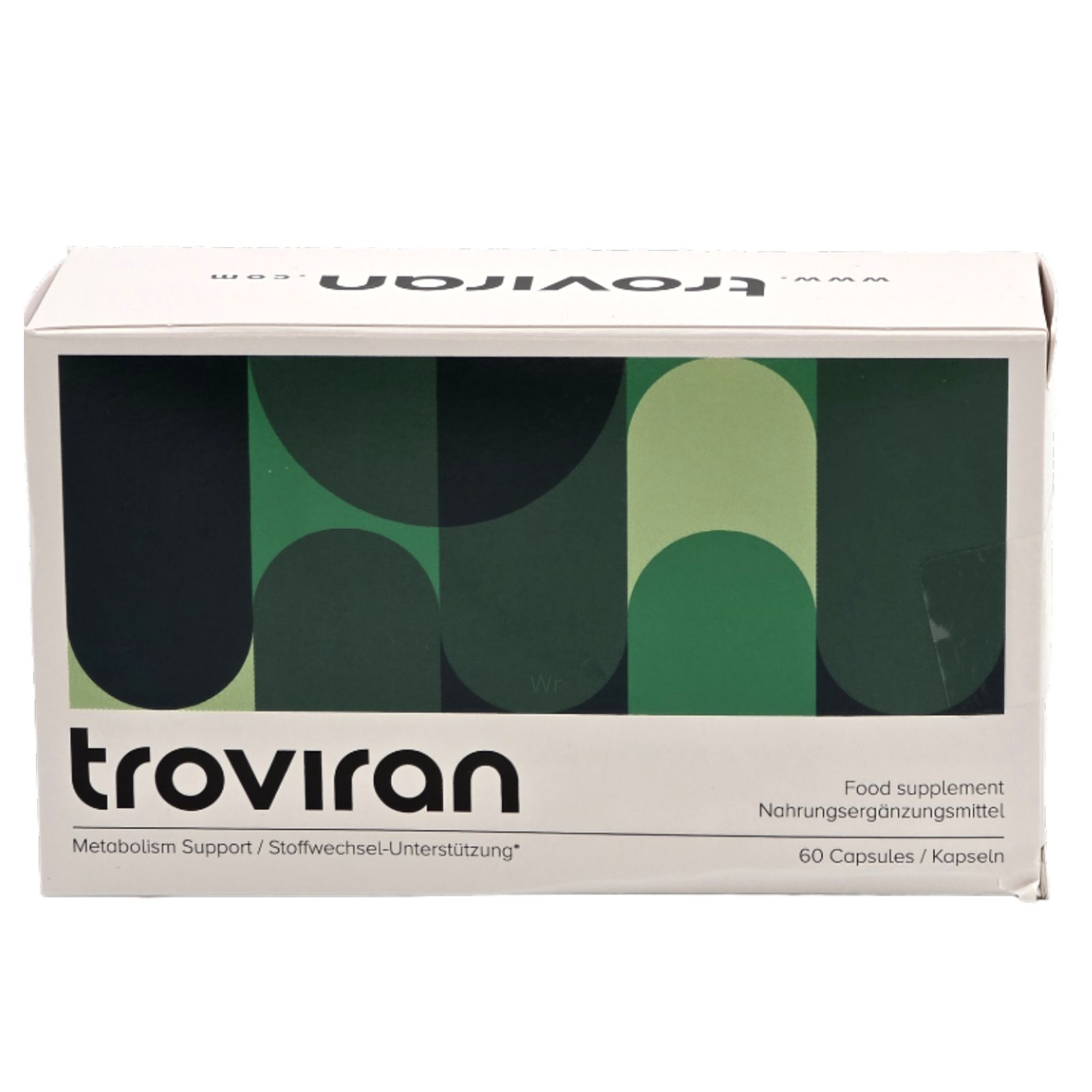 Boîte blanche avec motif vert et inscription "troviran". Contient 60 gélules. Inscription : "Complément alimentaire".