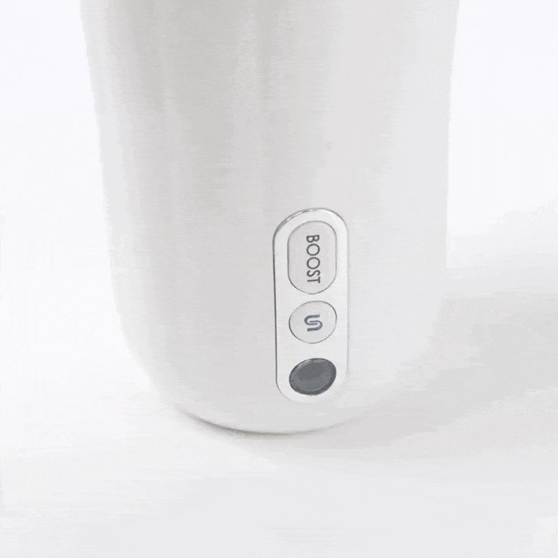 Wit wellnessproduct met knoppen. Opschrift "BOOST".