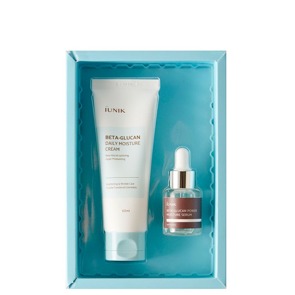 Set de soins iUNIK Beta-Glucan : Tube de crème hydratante et flacon de sérum dans un plateau bleu.