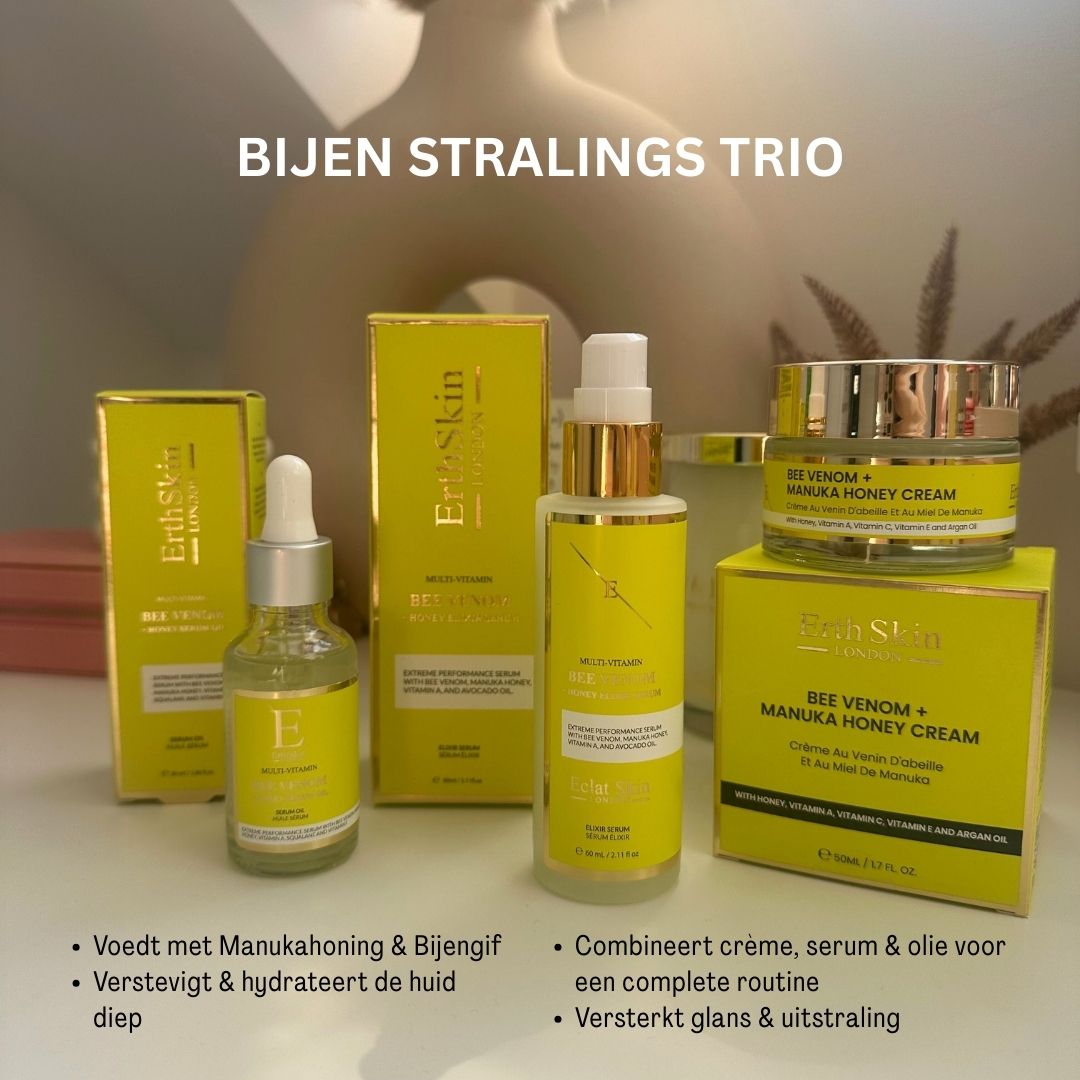 ErthSkin-trio met serum, crème en olie. Gele verpakking met tekst. Producten geplaatst op gele dozen.