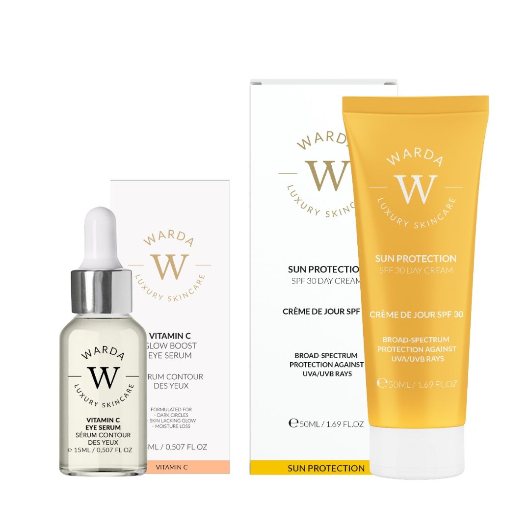 Serumfles en crèmetube met verpakking. Opschrift: Vitamine C, SPF 30. Merk: Warda Luxury Skincare.