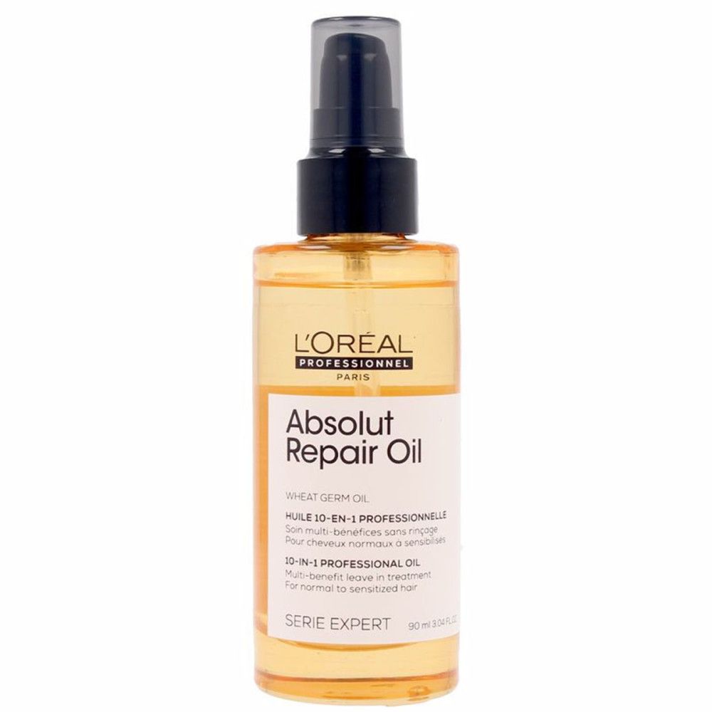 L'Oréal Professionnel Absolut Repair Oil 10-in-1 fles. Zwarte pomp. Gele vloeistof zichtbaar.