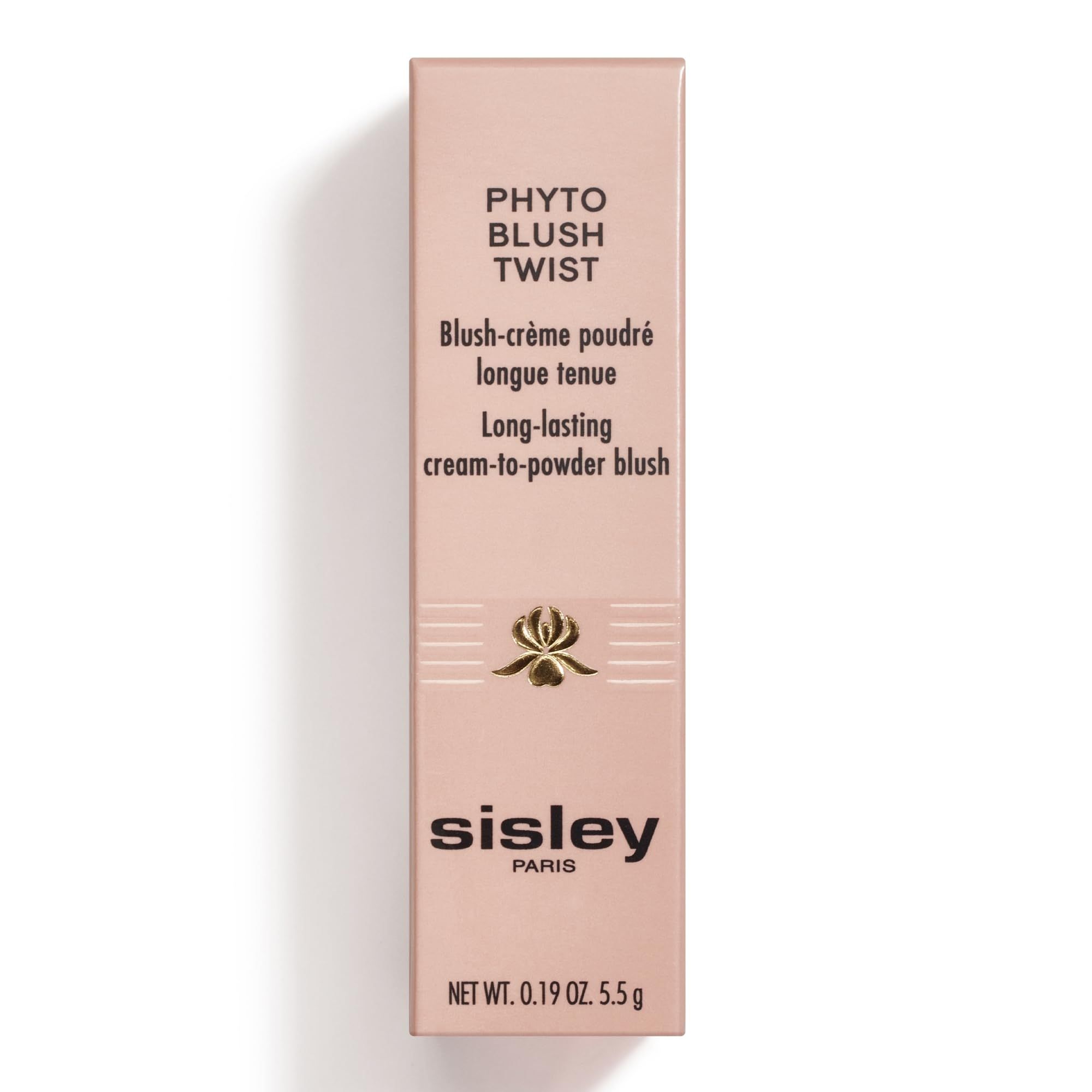 Emballage rose avec nom du produit et textes. Logo doré. Inscription "sisley PARIS".