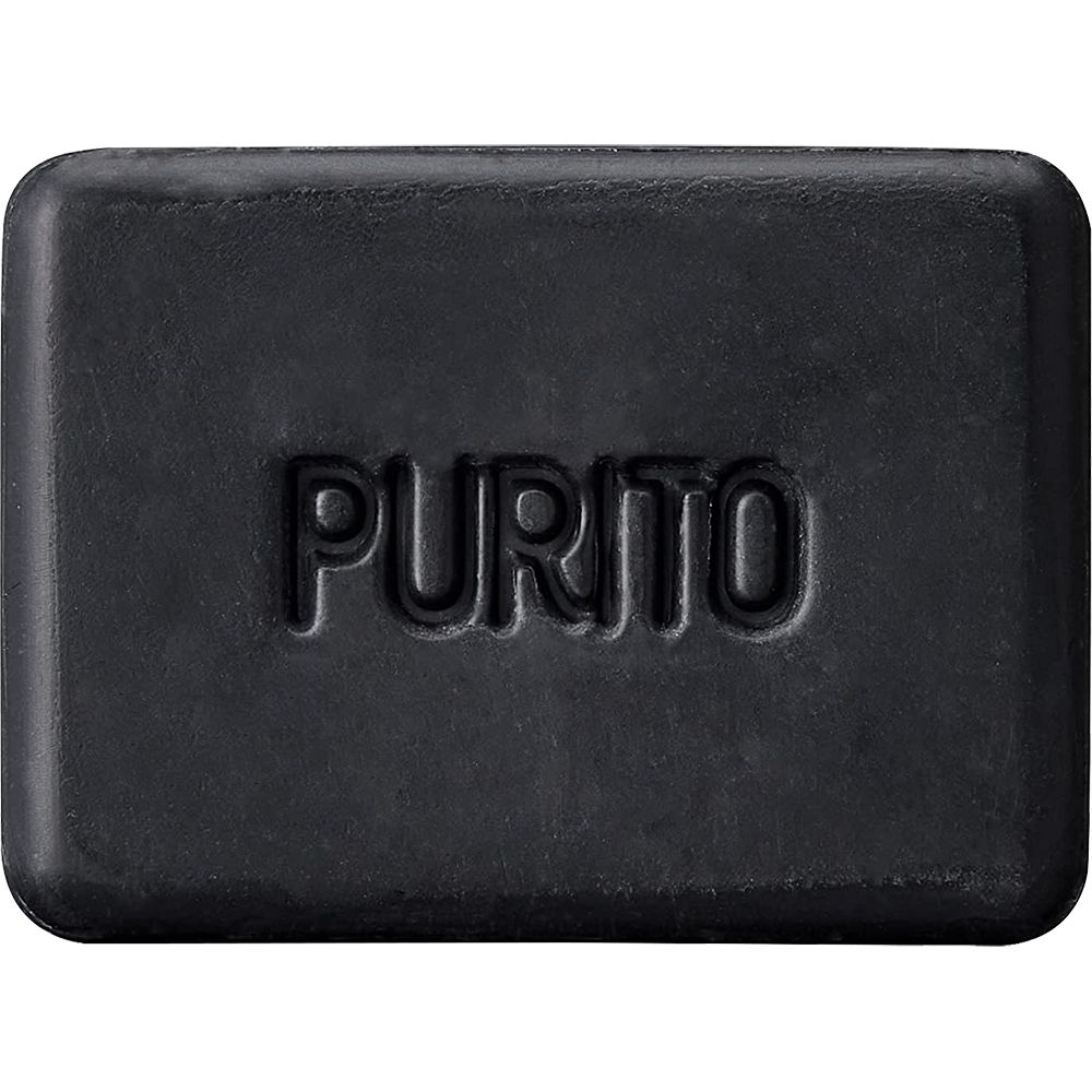 Zwarte zeep met afgeronde hoeken. In reliëf het woord 'PURITO'. Rechthoekige vorm.