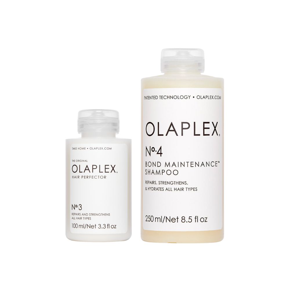 Deux flacons blancs avec texte noir. Un petit flacon avec "No.3 Hair Perfector", un grand avec "No.4 Bond Maintenance Shampoo".