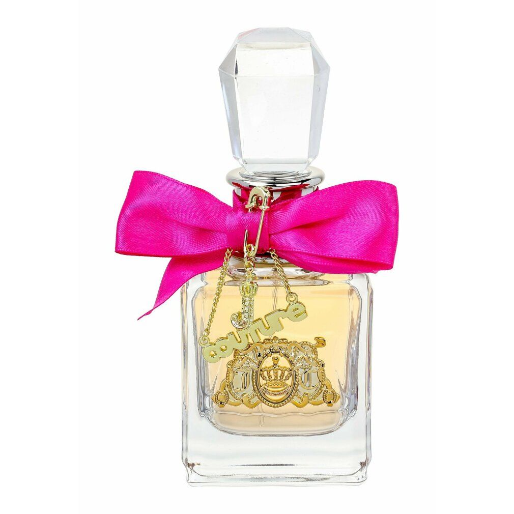 Flacon de parfum avec nœud rose et breloque. Flacon en verre rectangulaire avec emblème doré.