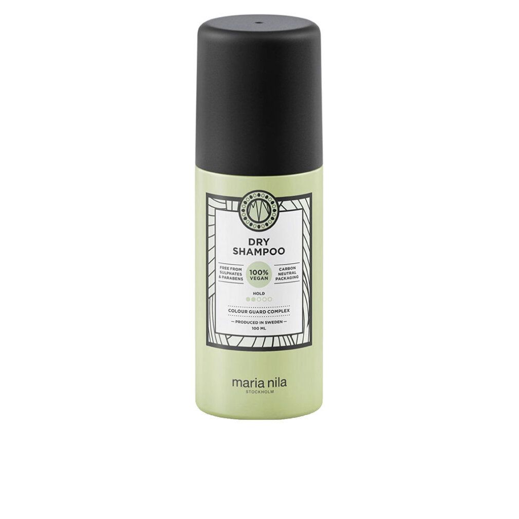 Shampooing sec vert avec bouchon noir. Inscription: Dry Shampoo, 100% Vegan, Colour Guard Complex. Marque: Maria Nila.