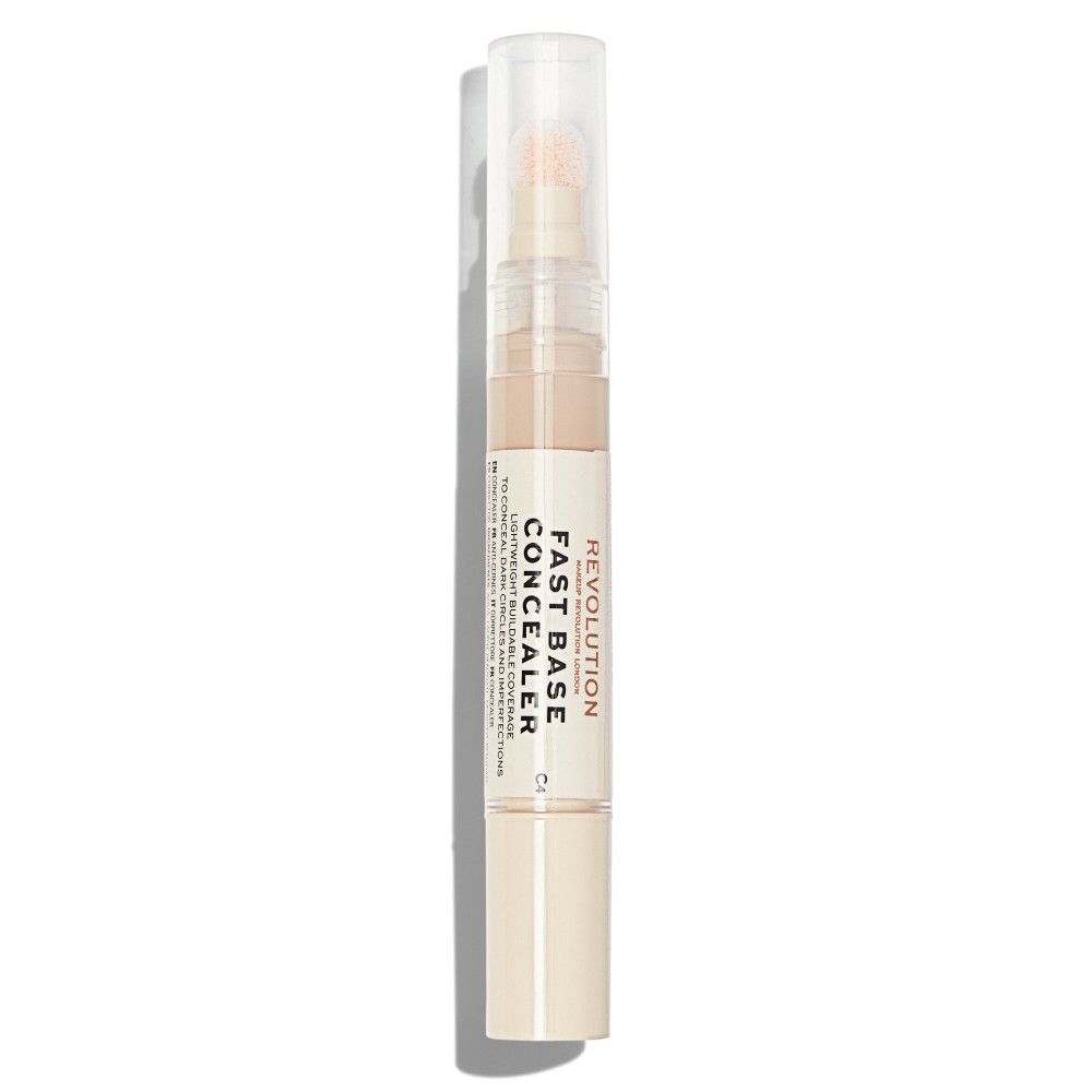Correcteur beige avec applicateur. Inscription: Fast Base Concealer. Marque: Revolution.