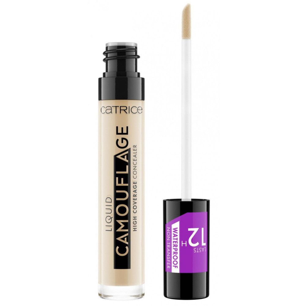 Correcteur liquide en tube transparent avec bouchon noir. Inscription: CAMOUFLAGE, LIQUID, HIGH COVERAGE CONCEALER. Applicateur visible.