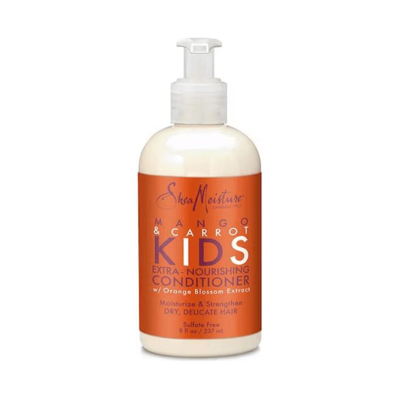 Fles conditioner. Opschrift: Mango & Carrot Kids Extra-Nourishing Conditioner. Met sinaasappelbloesemextract. Voor droog, fijn haar.