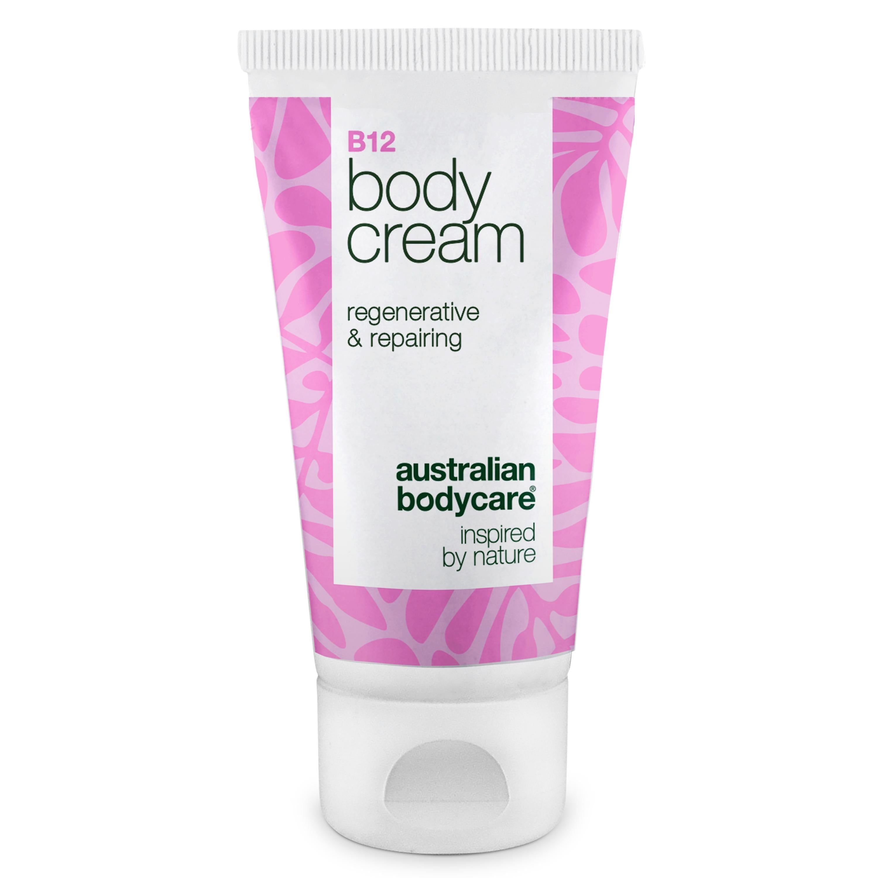 Tube blanche à motif floral rose. Inscription : B12 Body Cream, regenerative & repairing, Australian Bodycare.