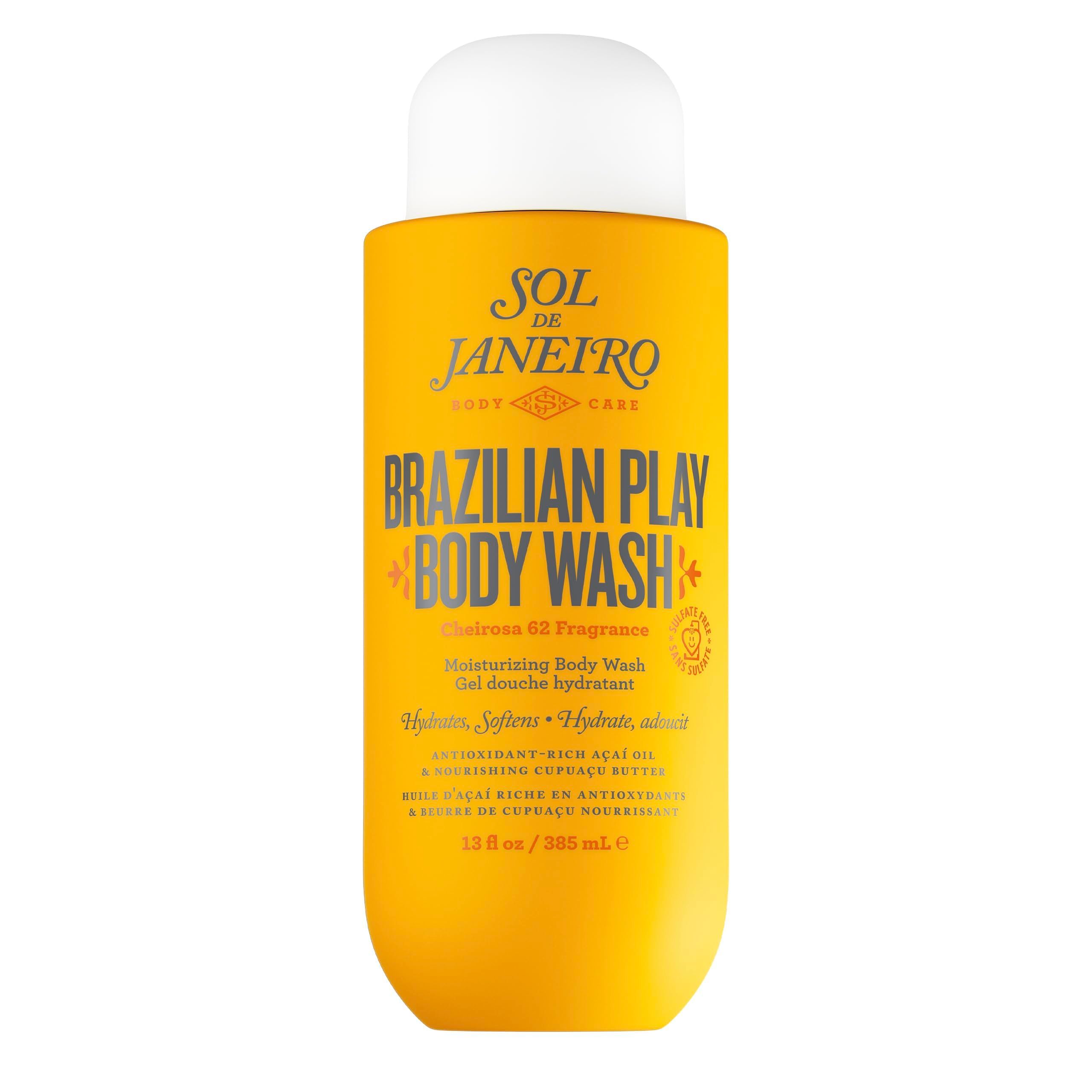 Sol de Janeiro hydraterende douchegel. Geel-oranje fles met witte dop. Tekst: Brazilian Play Body Wash, 385 ml.