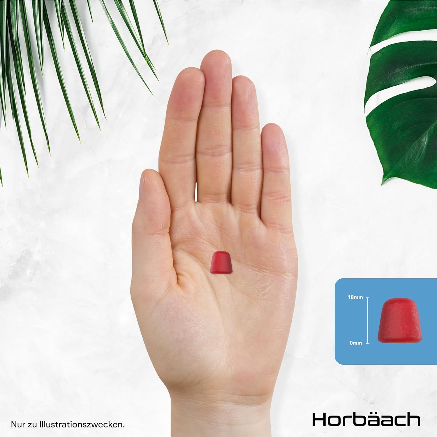 Gomme rouge dans une main. Dimensions: 15mm haut, 9mm large. Fond bleu.