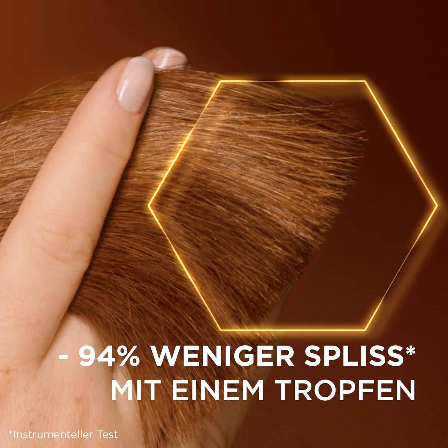 Mèche de cheveux avec contour jaune. Texte : -94% de pointes fourchues en moins avec une goutte. Test instrumental.