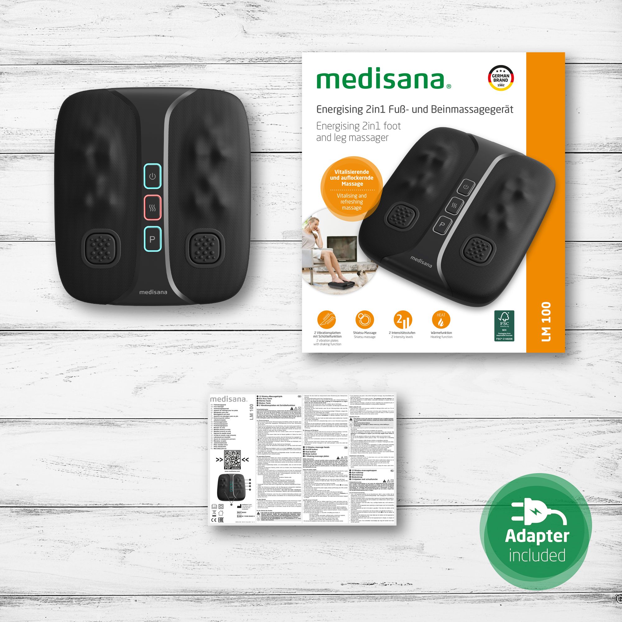 Voetmassager, verpakking, handleiding en voedingsadapter. Merk: medisana. Model: LM 100.