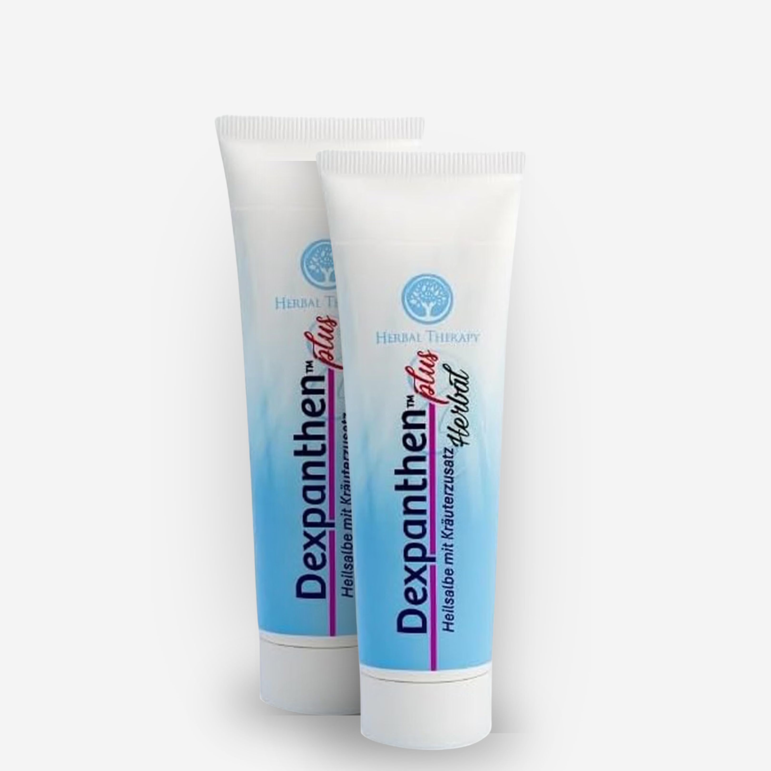 Deux tubes blancs de crème Dexpanthenol Plus Herbal avec extrait de plantes.