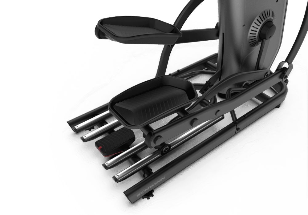 Detail van de pedalen en rails van een elliptische trainer. Zwart en zilver. Voor fitnesstraining.