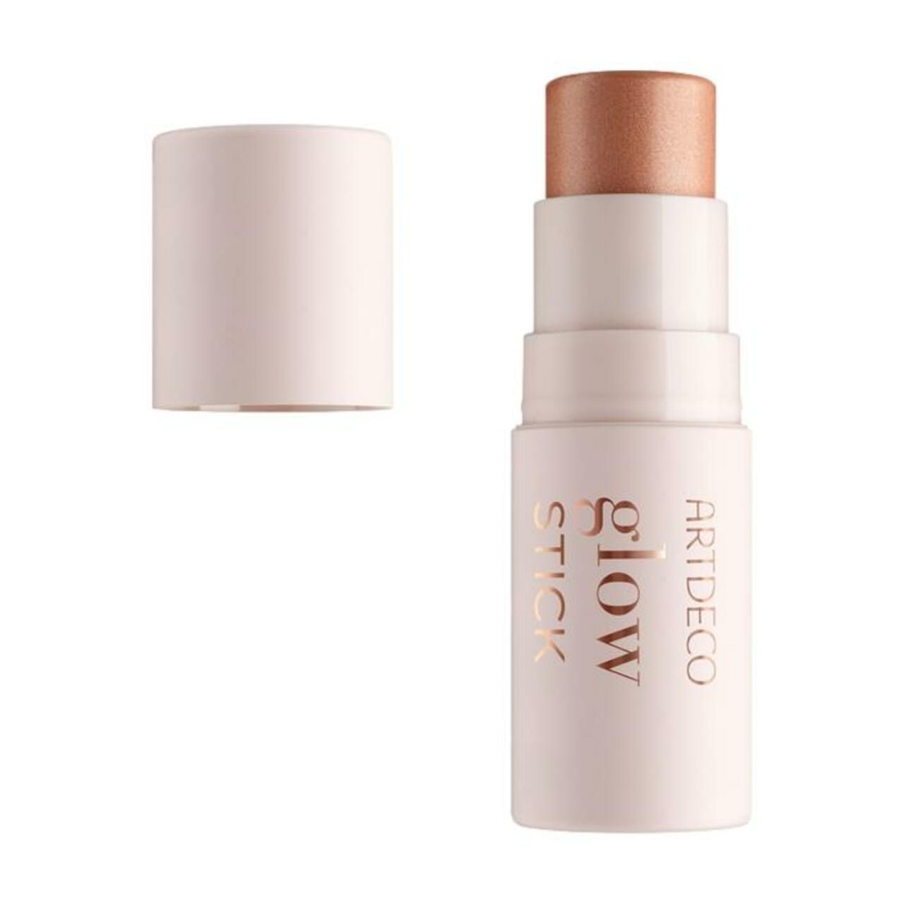 Artdeco Glow Stick. Emballage ouvert rose clair. Inscription dorée : Glow Stick. Pointe bronzée visible.