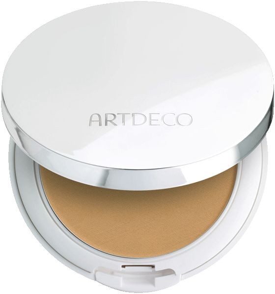Witte, ronde Artdeco make-up doos, open. Crèmefoundation binnenin. Deksel met Artdeco-opschrift.