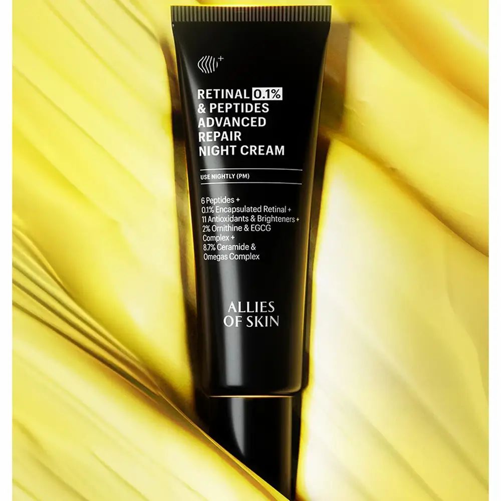 Tube noir avec texte blanc. Nom du produit: Retinal 0,1% & Peptides Advanced Repair Night Cream. Marque: ALLIES OF SKIN.