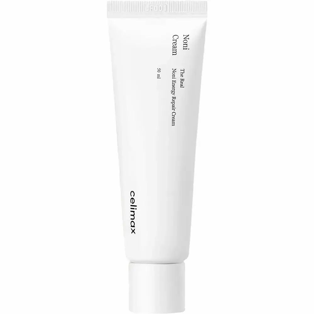 Witte tube met productnaam en logo. Productnaam: Noni Cream. Tekst: The Real Noni Energy Repair Cream.