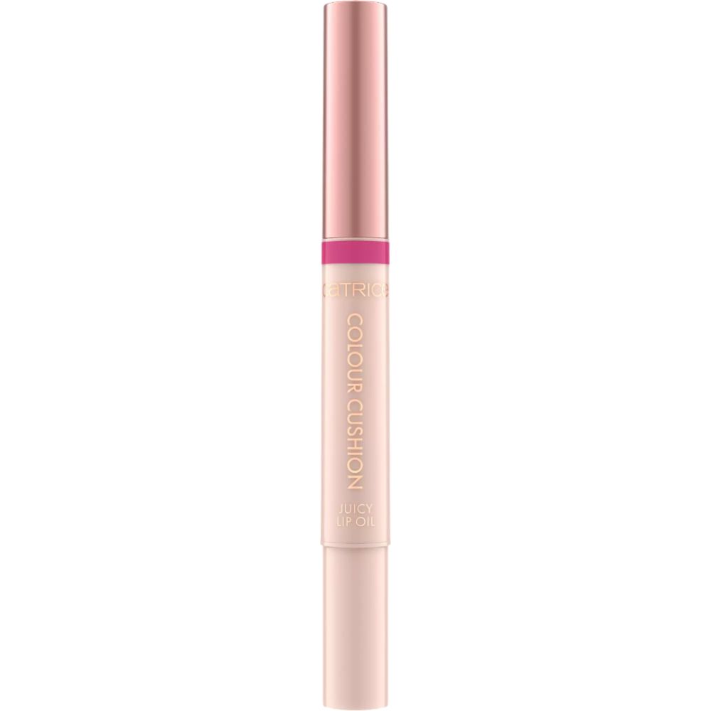 Lipolie-applicator. Roze behuizing, roze ring. Opschrift: COLOUR CUSHION JUICY LIP OIL. Roze dop.