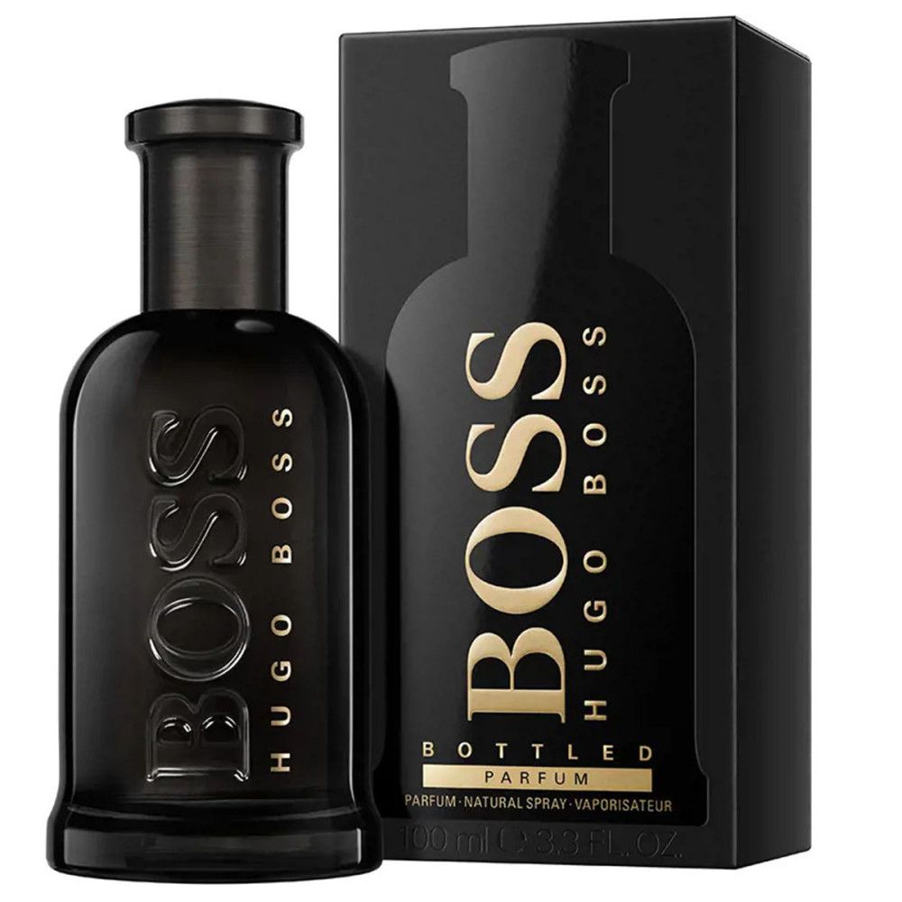 Zwarte fles met gouden belettering BOSS HUGO BOSS. Zwarte verpakking met productafbeelding en belettering.