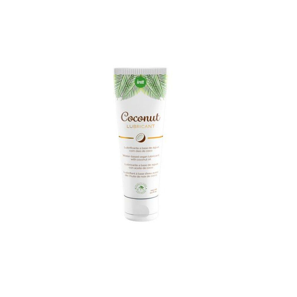 Tube blanc de lubrifiant à la noix de coco, motif de feuilles en haut.