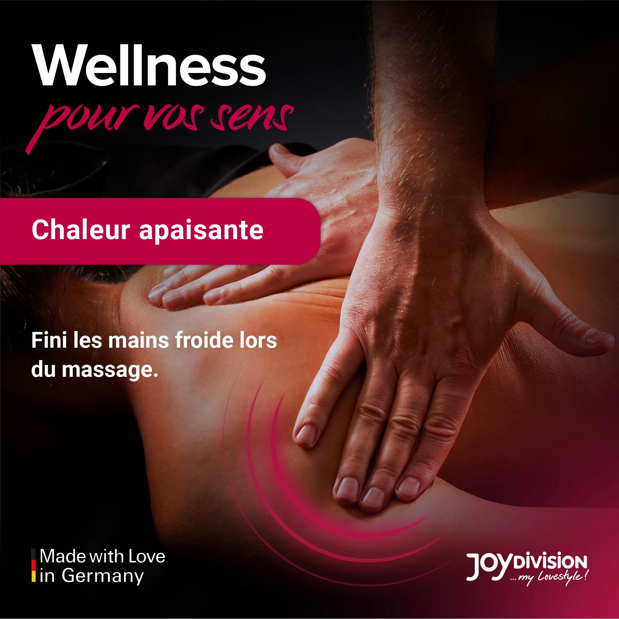 Bouteille d'huile de massage à la cerise, avec des cerises et des éclaboussures.