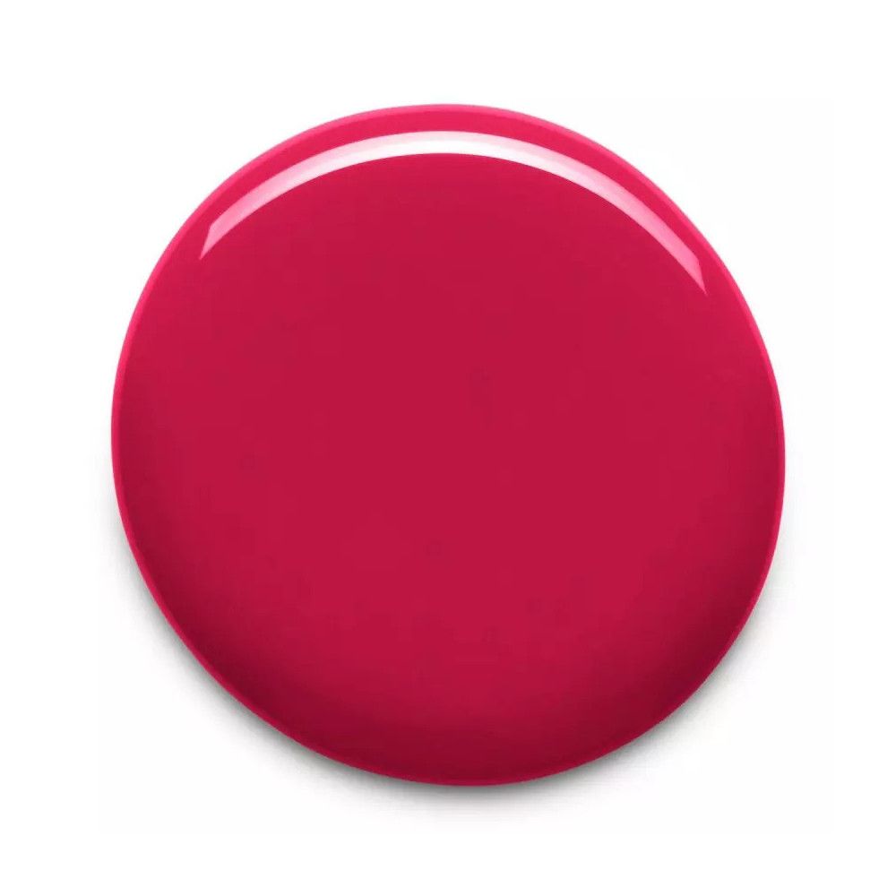 Goutte ronde de vernis à ongles rose sur fond blanc. Surface brillante avec ombre.