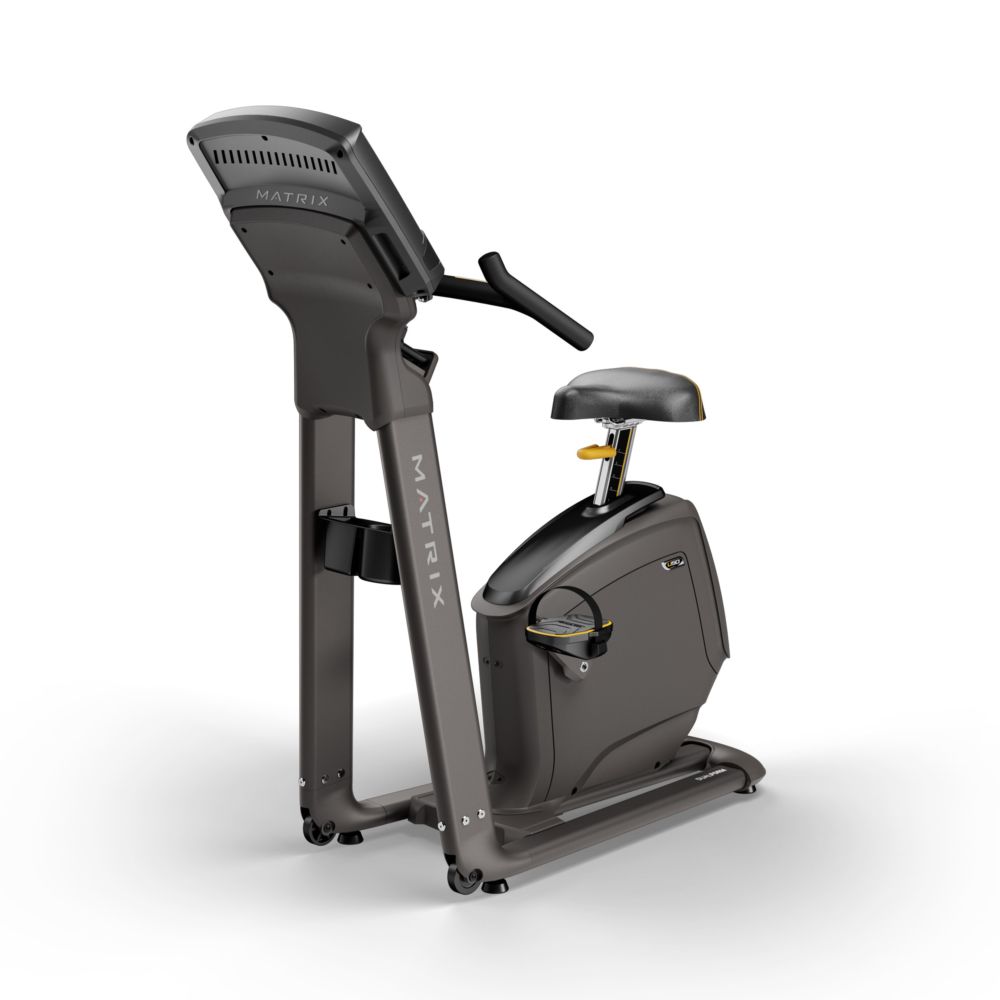 Vision Fitness U50. Vélo d'appartement gris, vue latérale. Siège, console et pédales visibles. Logo Matrix.