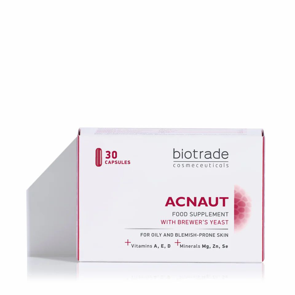 Biotrade Acnaut voedingssupplement. Witte doos. Opschrift: 30 capsules, voor een onzuivere huid. Biotrade logo.