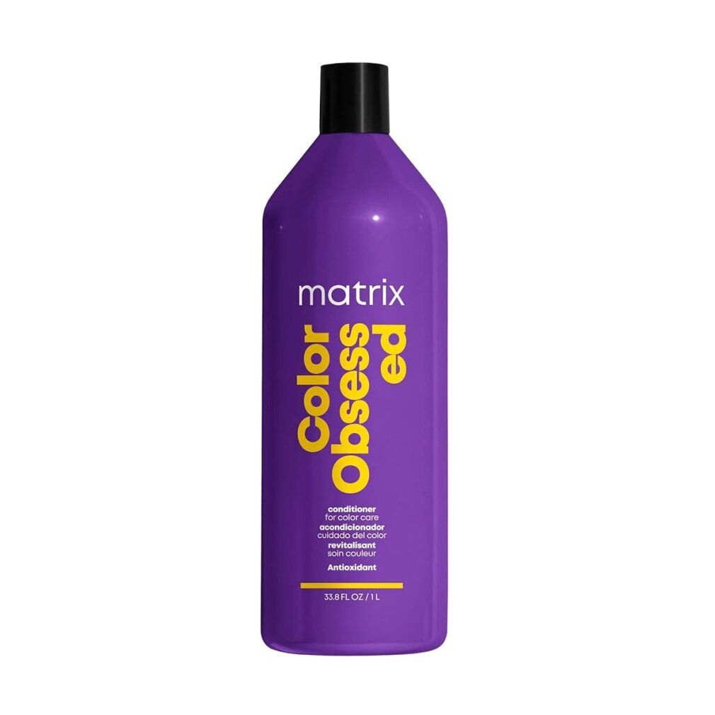 Flacon violet avec bouchon noir. Inscription: Matrix Color Obsessed. Texte jaune sur l'étiquette.
