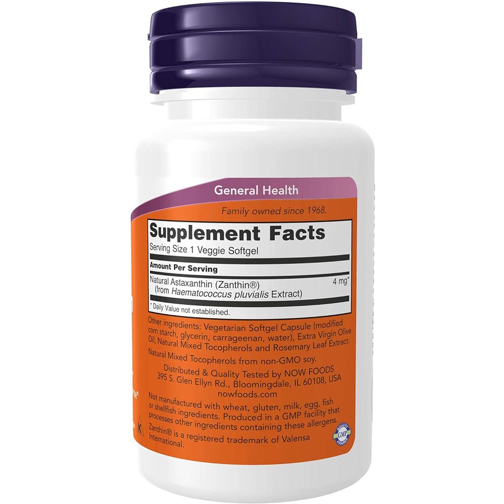 Bouteille de supplément d'astaxanthine. L'étiquette indique 'Supplement Facts' et 'Natural Astaxanthin (Zanthin®)'.