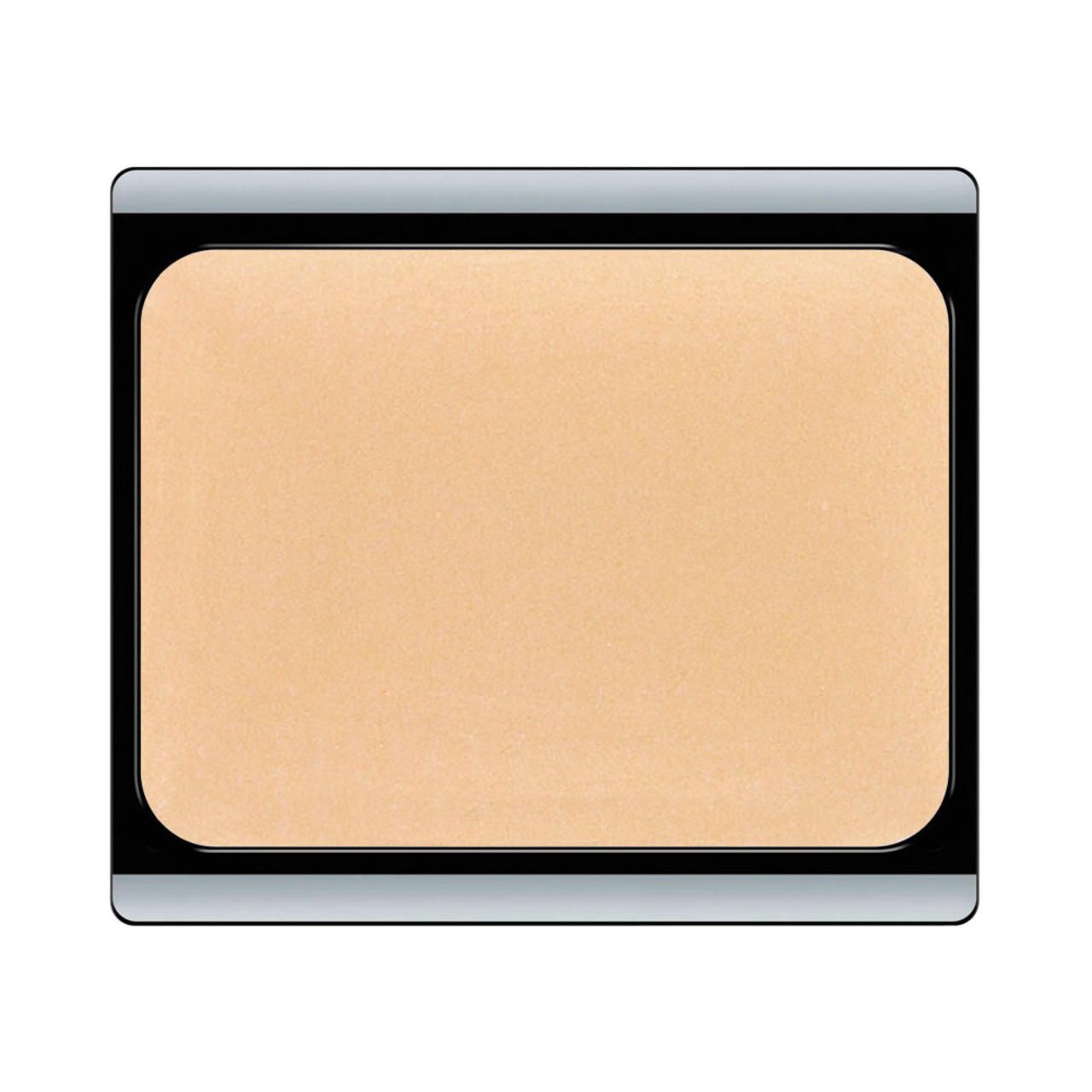 Compacte make-up in rechthoekige doos. Lichtbeige crème. Zwarte rand, zilveren omlijsting.