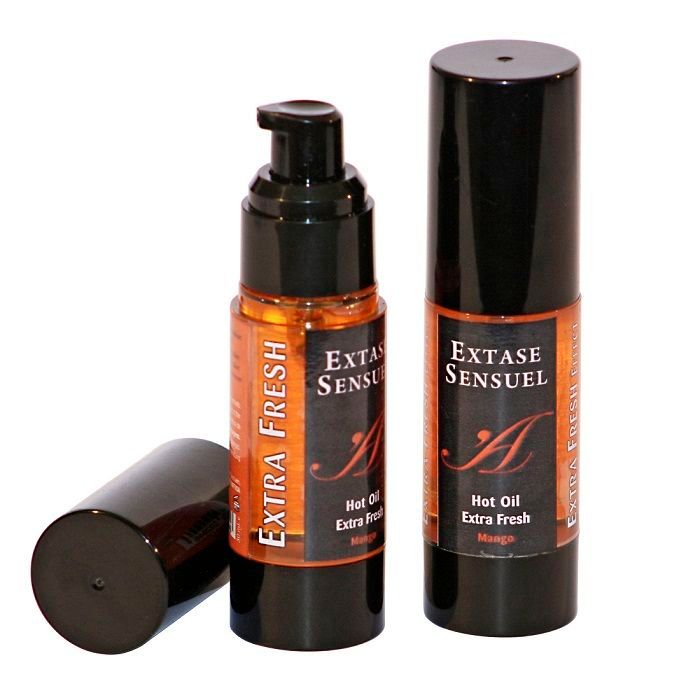 Twee flessen Extase Sensuel Hot Oil Extra Fresh Mango met pompdispensers en een dop.