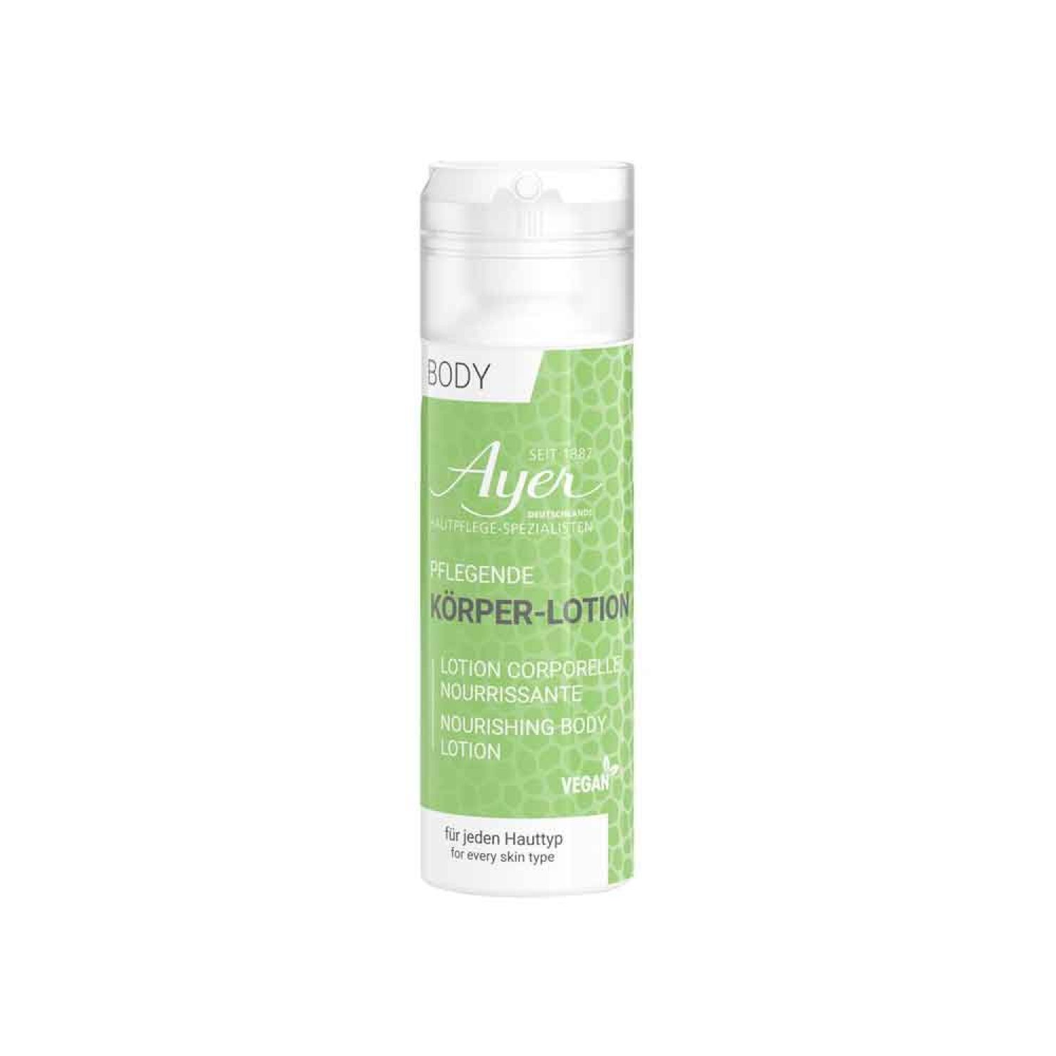 Flacon de lotion pour le corps avec étiquette verte. Texte: Ayer, Pflegende Körper-Lotion, Vegan. Bouchon blanc.