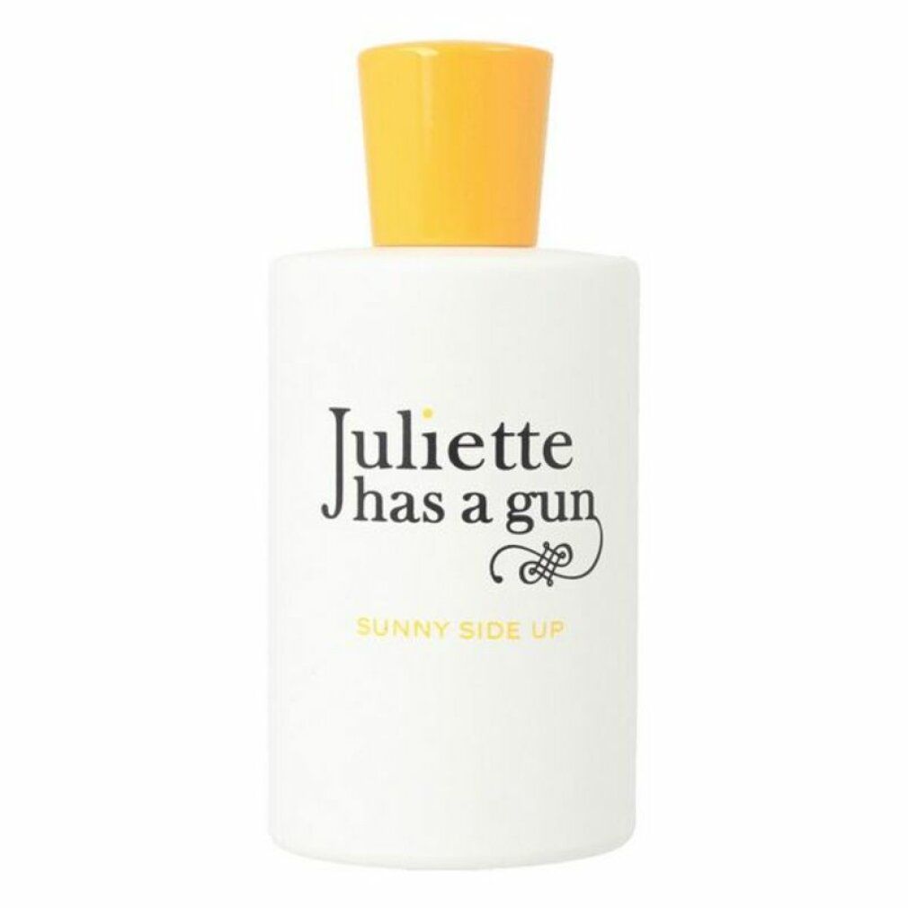 Flacon blanc à bouchon jaune. Texte noir: Juliette has a gun, Sunny Side Up.