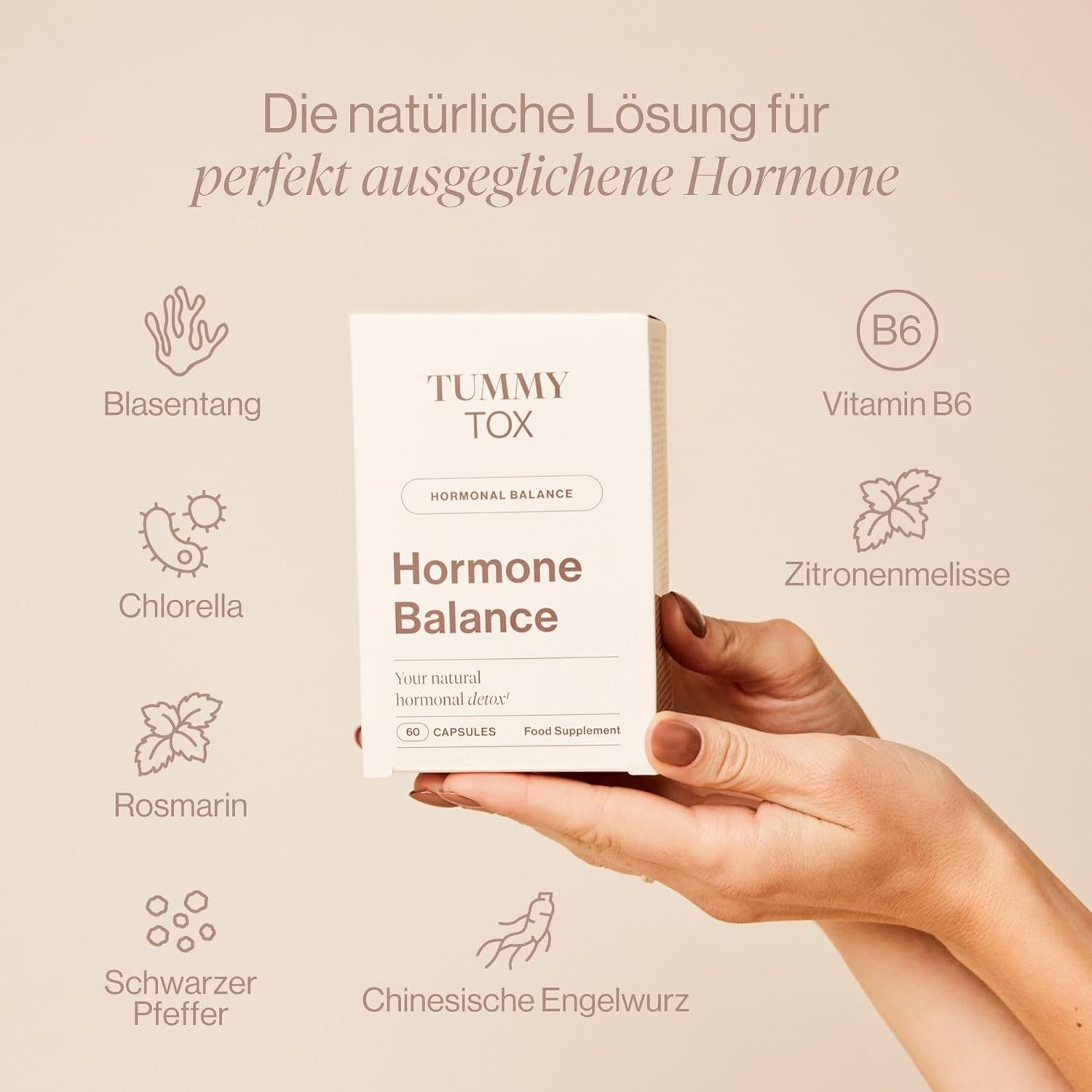 Main tenant une boîte blanche "Tummy Tox Hormone Balance". Ingrédients illustrés. Texte en allemand.