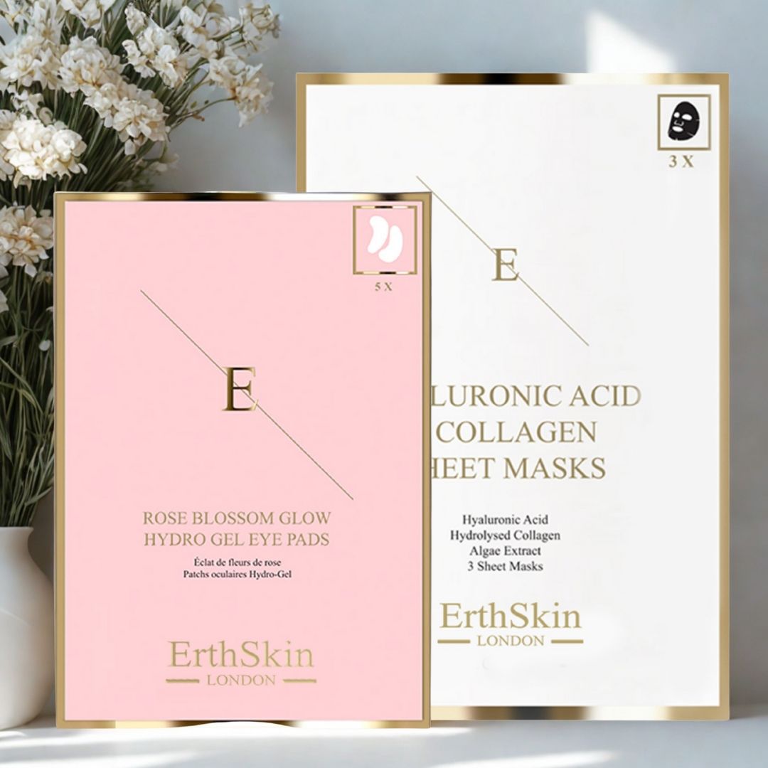 Twee productverpakkingen. Een roze verpakking met oogpads, een witte verpakking met gezichtsmaskers. Beide met gouden rand en het 'E' logo van ErthSkin London.