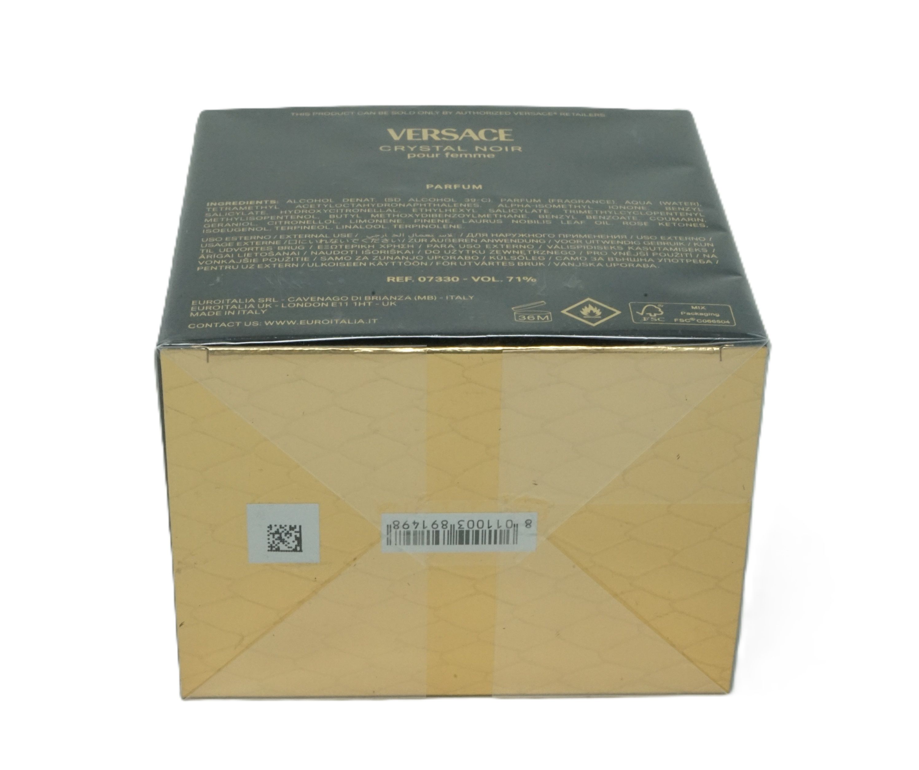 Dessous d'un emballage noir Versace. Fond doré avec code-barres et texte. Inscription: Versace Crystal Noir.