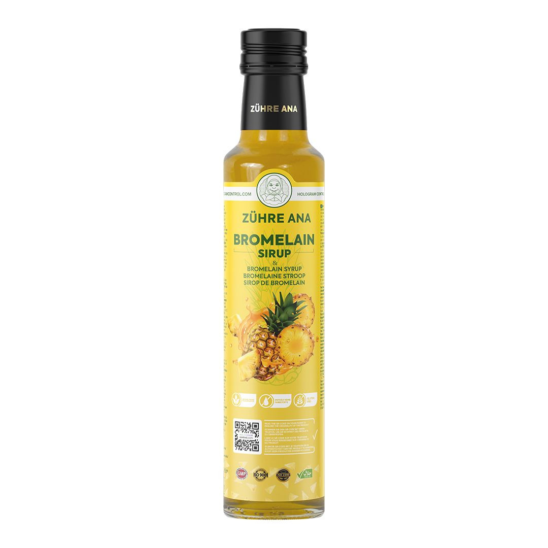 Bouteille de sirop de bromélaïne Zühre Ana avec bouchon noir et étiquette jaune.