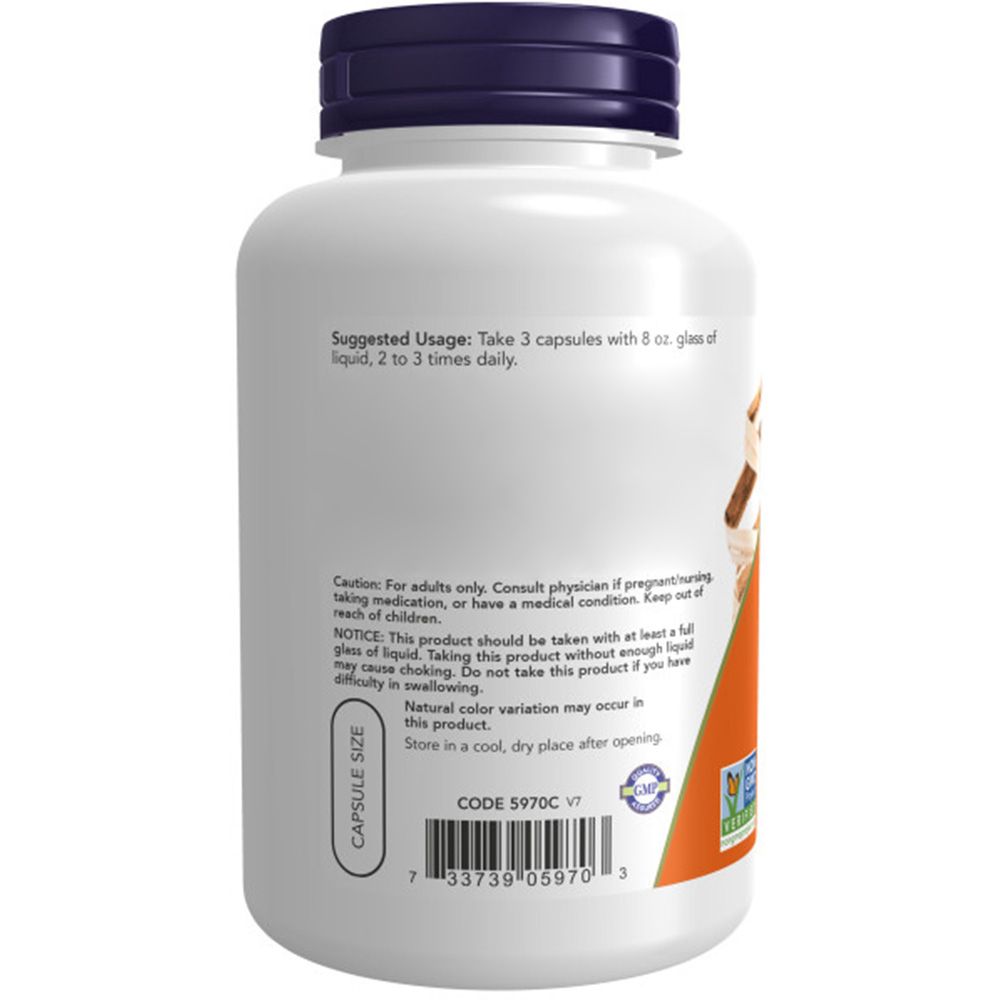 Achterkant van de fles. Oranje etiket met gebruiksaanwijzing en waarschuwingen. Code 5970C V7.