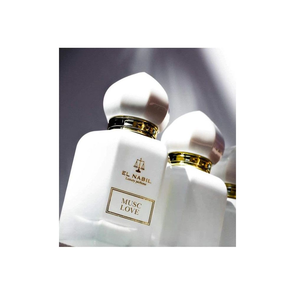 Twee witte parfumflacons met gouden ringen. Opschrift: El Nabil, Musc Love.